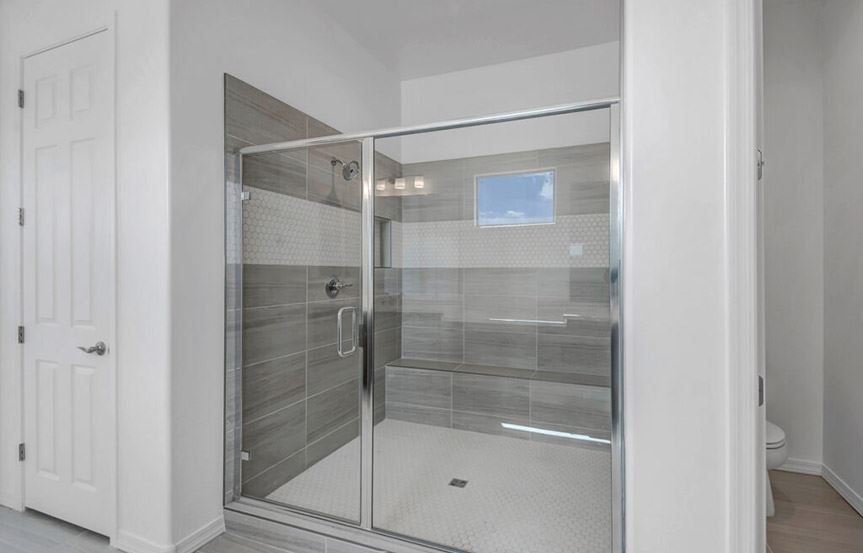 Sandpiper by Woodside Homes Primary Bath Shower in Alamar community in Avondale, AZ