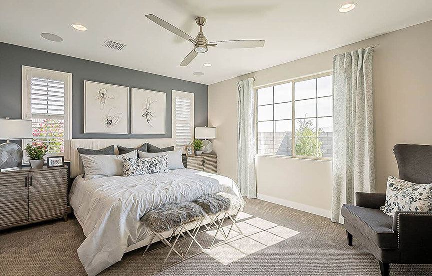 Castellano model home Primary Bedroom by Brightland Homes at Alamar community in Avondale, AZ