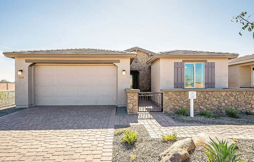 Castellano model home front exterior by Brightland Homes at Alamar community in Avondale, AZ